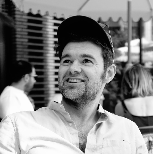 Headshot of Lukasz Szczesiak